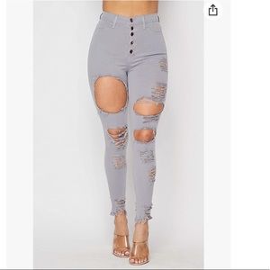 $High waisted extreme ripped jeans